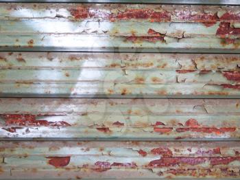 Background of old metal door in grungy style