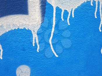 Aged street wall background with colorful paint splashes