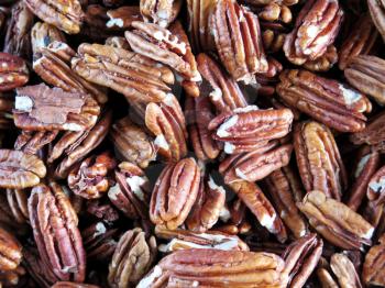 Closeup of pecan nuts for background