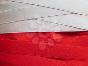 Poland flag or banner made with red and white ribbons