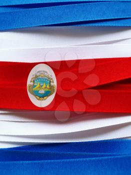 Costa Rica flag or banner made with red, blue and white ribbons