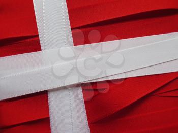 Denmark flag or banner made with red and white ribbons