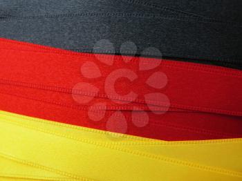 GERMANY flag or banner made with black, red and yellow ribbons