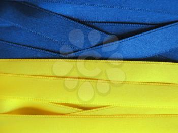 UKRAINE flag or banner made with blue and yellow ribbons
