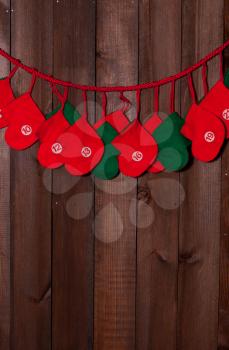 Christmas decoration socks for presents on brown door