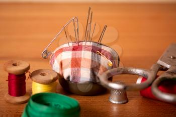 Set of old sewing accessories for hand sewn