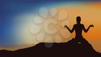 young slender girl doing yoga on a background of sunrise in the mountains sitting in a lotus pose