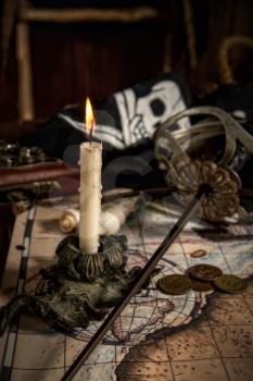 Items from pirated goods randomly laid out on the old ship's table