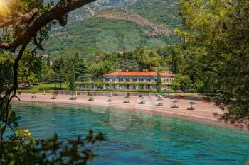 Budva - Montenegro, 29 Jully: Empty Beach in Famous Royal Park Milocer and Hotel 