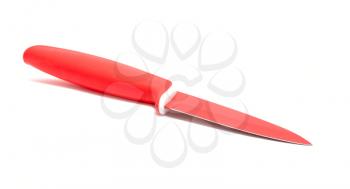 Red ceramic knife placed on a white background.