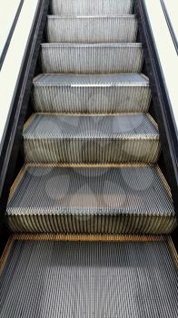 Close up of metal escalator steps.