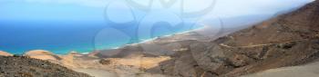 Aerial panoramic view of the beautiful Cofete beach on Fuerteventura island, Spain.