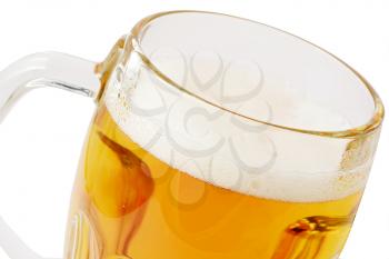 Full mug of beer with foam isolated over white background.