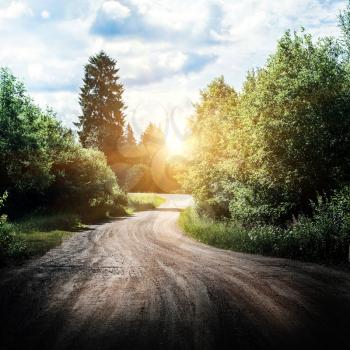Rural road landscape. Summer sunrise trip background