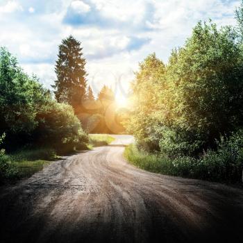 Rural road landscape. Summer sunrise trip background