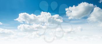 Clear blue sky and white clouds summer background