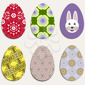 Set of color ornamental Easter eggs on white