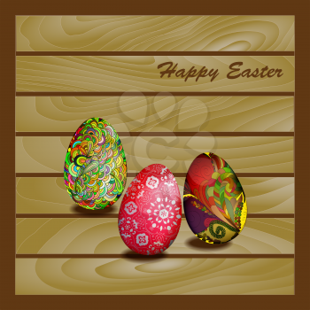 Card with Easter eggs on a wooden wall background