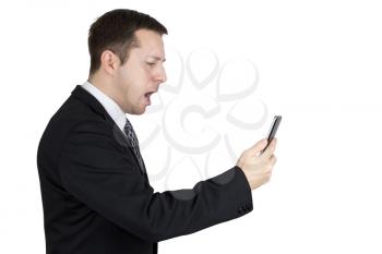 Businessman in Black Suit Holding Smartphone in Hand And Feeling Angry Against White Background