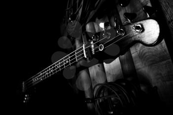 Bass Guitar In Music Studio. Musical Instruments and Equipment