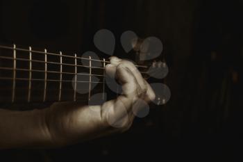 Acoustic Guitar Player Performing. Guitarist Playing In Music Studio