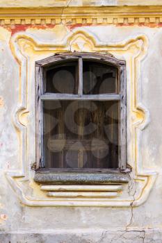 Window Frame With Vintage Decor On a Ornate, Rustic, Worn, Aged Wall