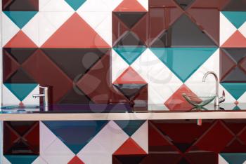 kitchen with colorful tiles wall