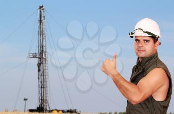 oil worker with thumb up 