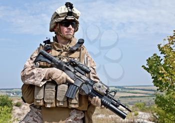 Close-up photo of US marine with his rifle