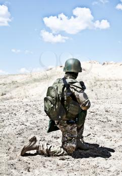 Soldier in the desert during the military operation