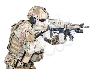 Bearded special warfare operator with assault rifle