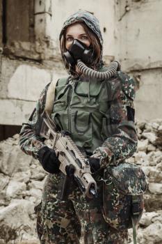 Post apocalypse. Female survivor in gas mask