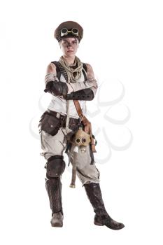 Nuclear post apocalypse life after doomsday concept. Grimy female survivor in tatters. Studio portrait on white background