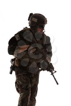 United states Marine Corps special operations command Marsoc raider with weapon. Studio shot of Marine Special Operator white backgroun