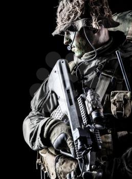 Jagdkommando soldier Austrian special forces with rifle on dark background