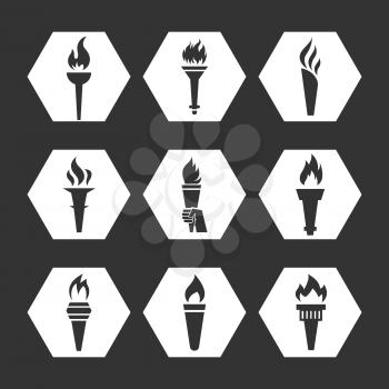 Grey flat torch with flame icons set. Monochrome torch icons collection. Vector illustration
