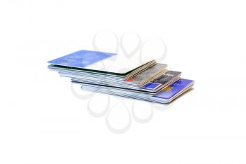 Credit cards combined by a short flight of stairs on a white background.