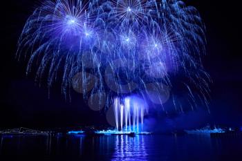 Blue colorful fireworks on the black sky background