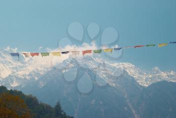 Buddhist praying flags in nepal high mountains