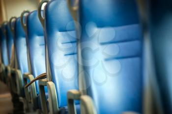 Empty blue seats in european modern train
