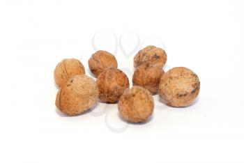 A group of walnuts isolated on white.
