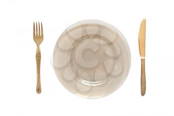 Dinner Plate, Knife, and Fork isolated on white.