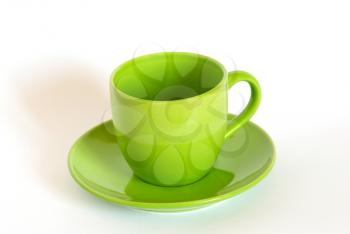 Green tea cup and saucer on white background.