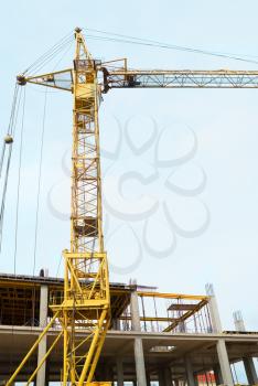 Building crane with the blue sky background