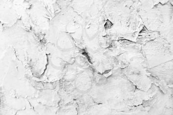 Closeup fragment of grunge weathered surface. Textured background of cracked paint.