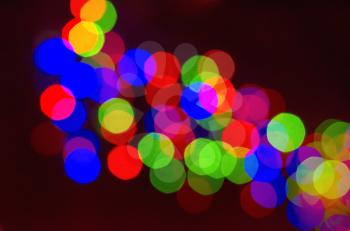 Abstract bokeh blurred color light background. Blur lights for Christmas, party, holiday wallpaper. Defocused lights.