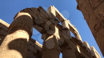 Buildings and columns of ancient Egyptian megaliths. Ancient ruins of Egyptian buildings