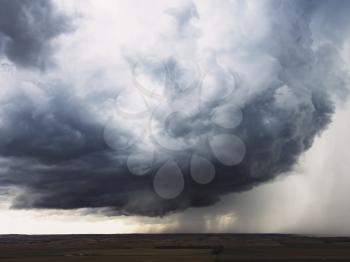 The sky is clear. Cumulus clouds and rain clouds. Storm