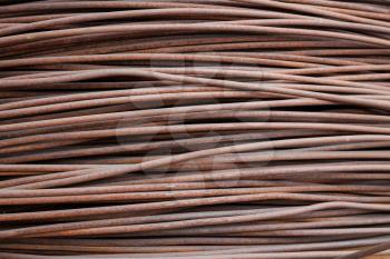 Heap of steel rusty wire armature texture background 