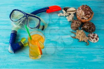 Beach vacation background. Beach party. Sea shells. Adventure. Snorkeling mask. Diving mask. Watersport. Sea vacation. Sea holidays